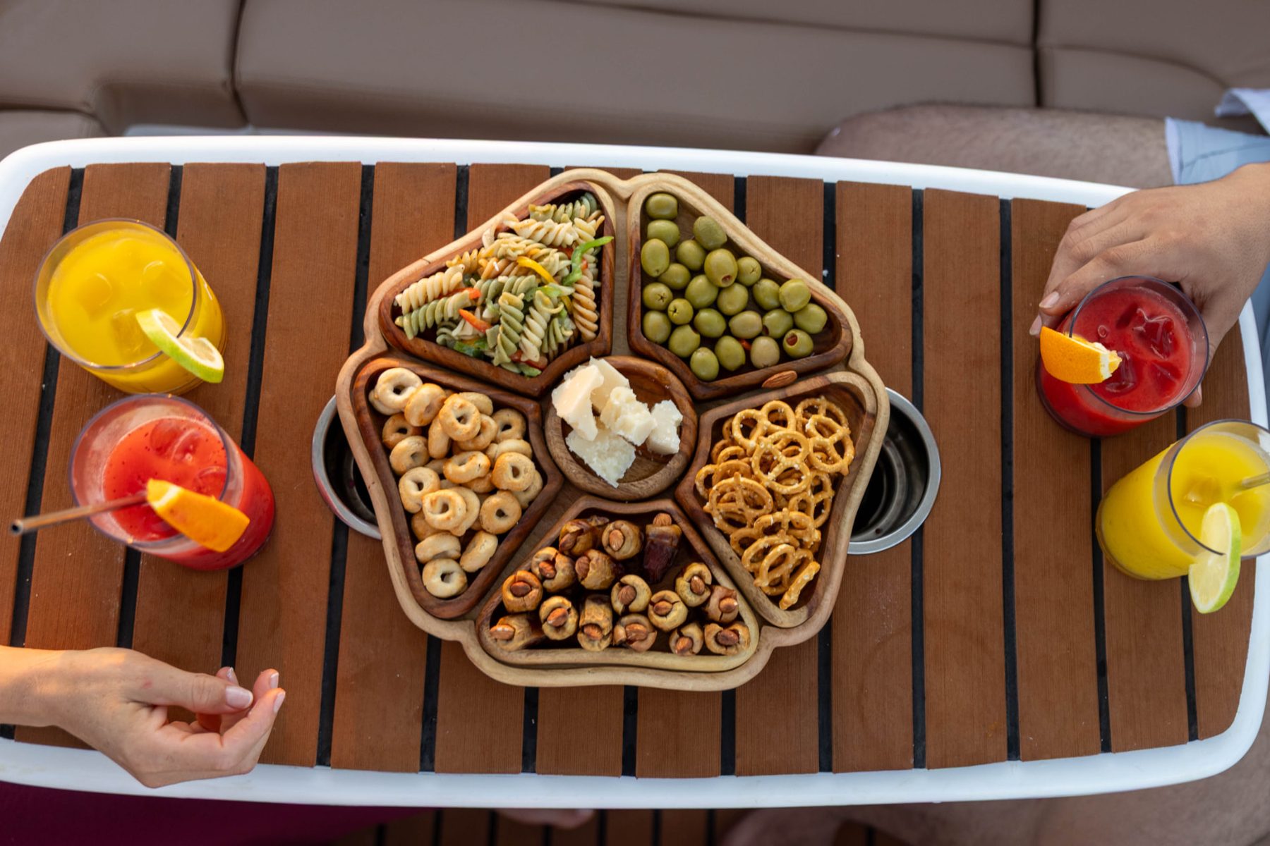 Fresh snack platter and cold drinks served on board the Maro Redsea speedboat